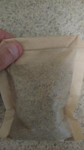 Tea bag folded down into a packet.